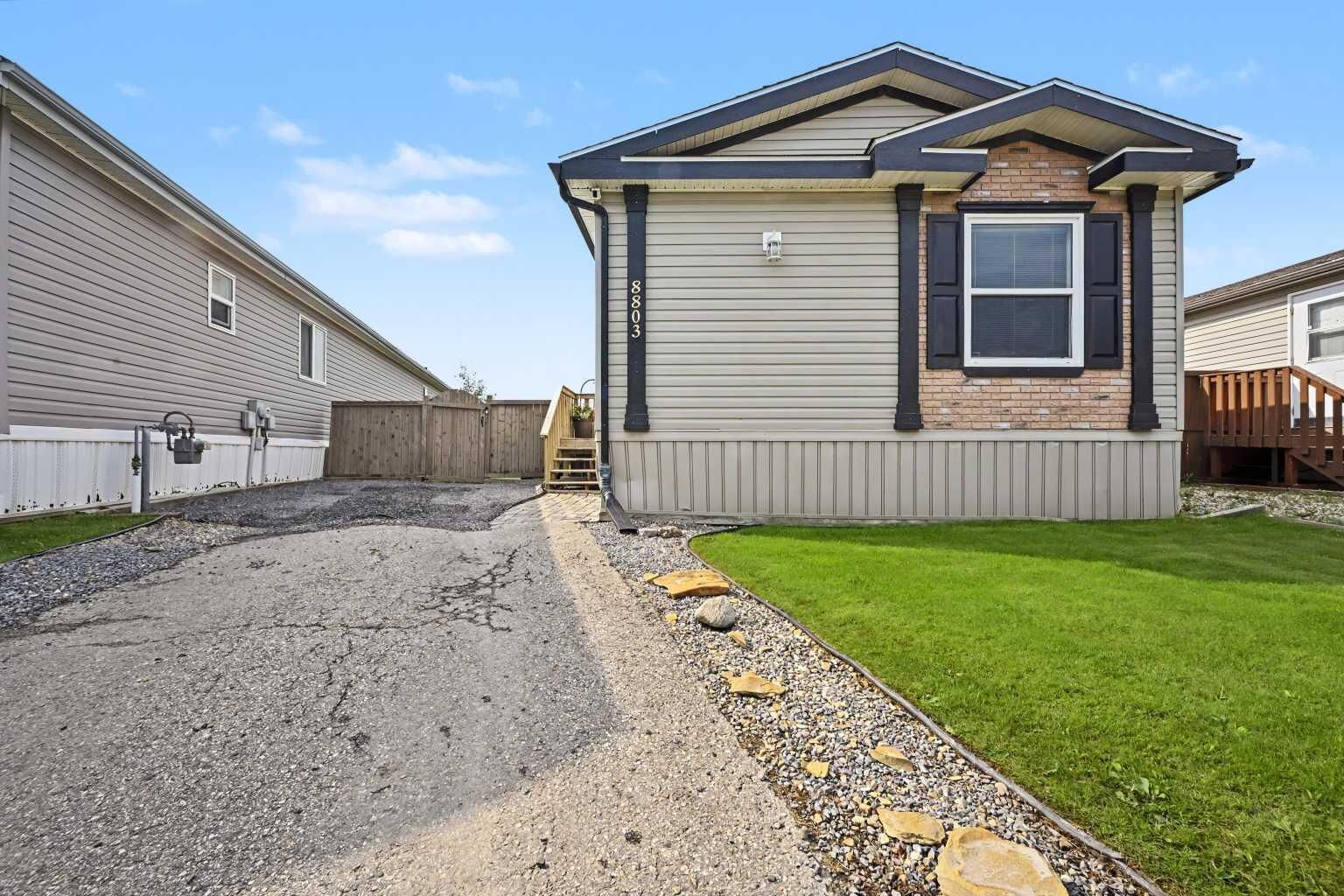 Property Photo:  8803 86 Avenue  AB T8X 0C5 
