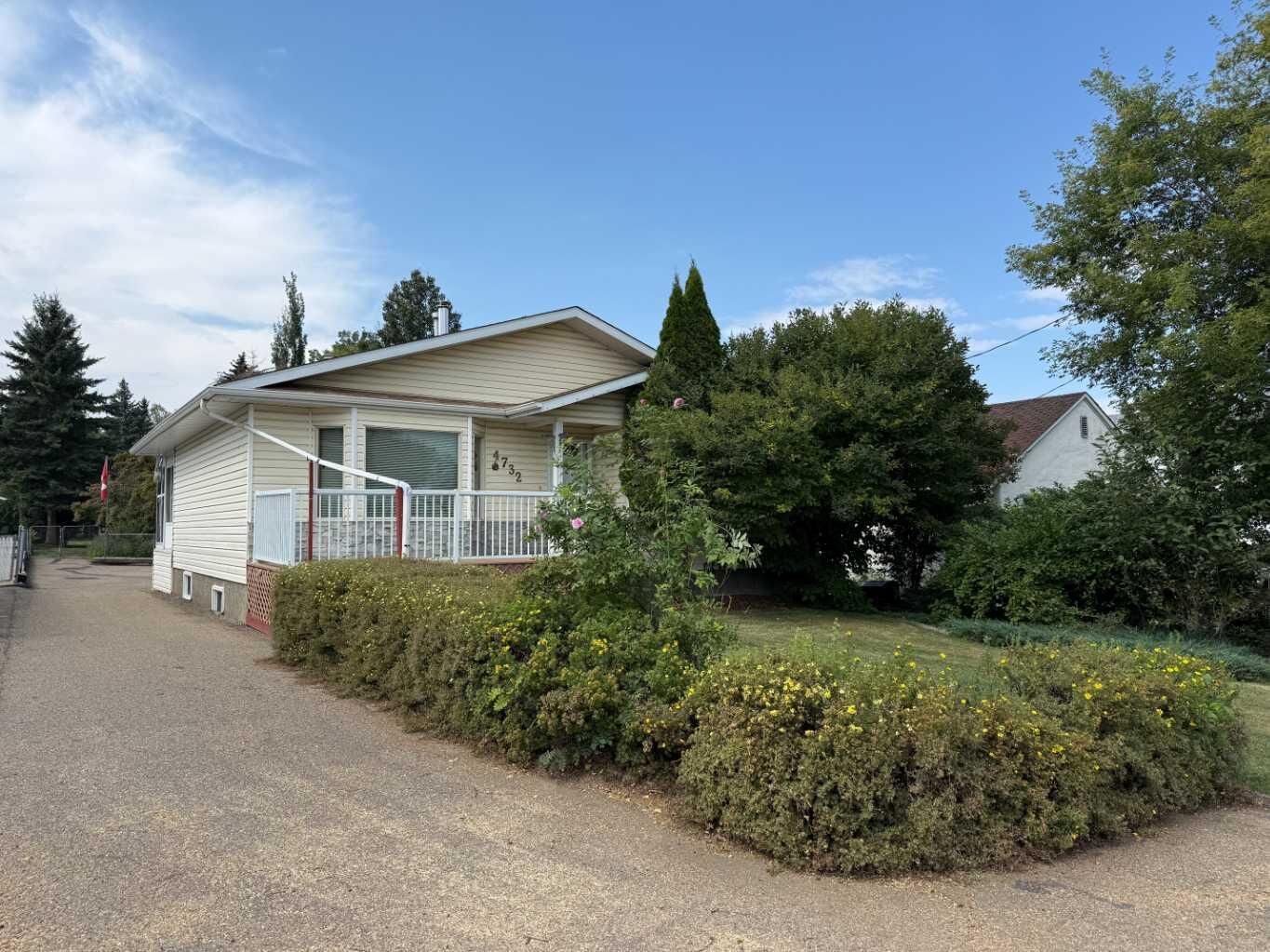 Property Photo: 4732 48 Street AB T4S 1M9