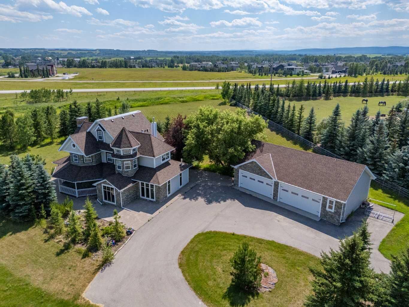 Property Photo: 31055 Elbow River Drive AB T3Z 2T9