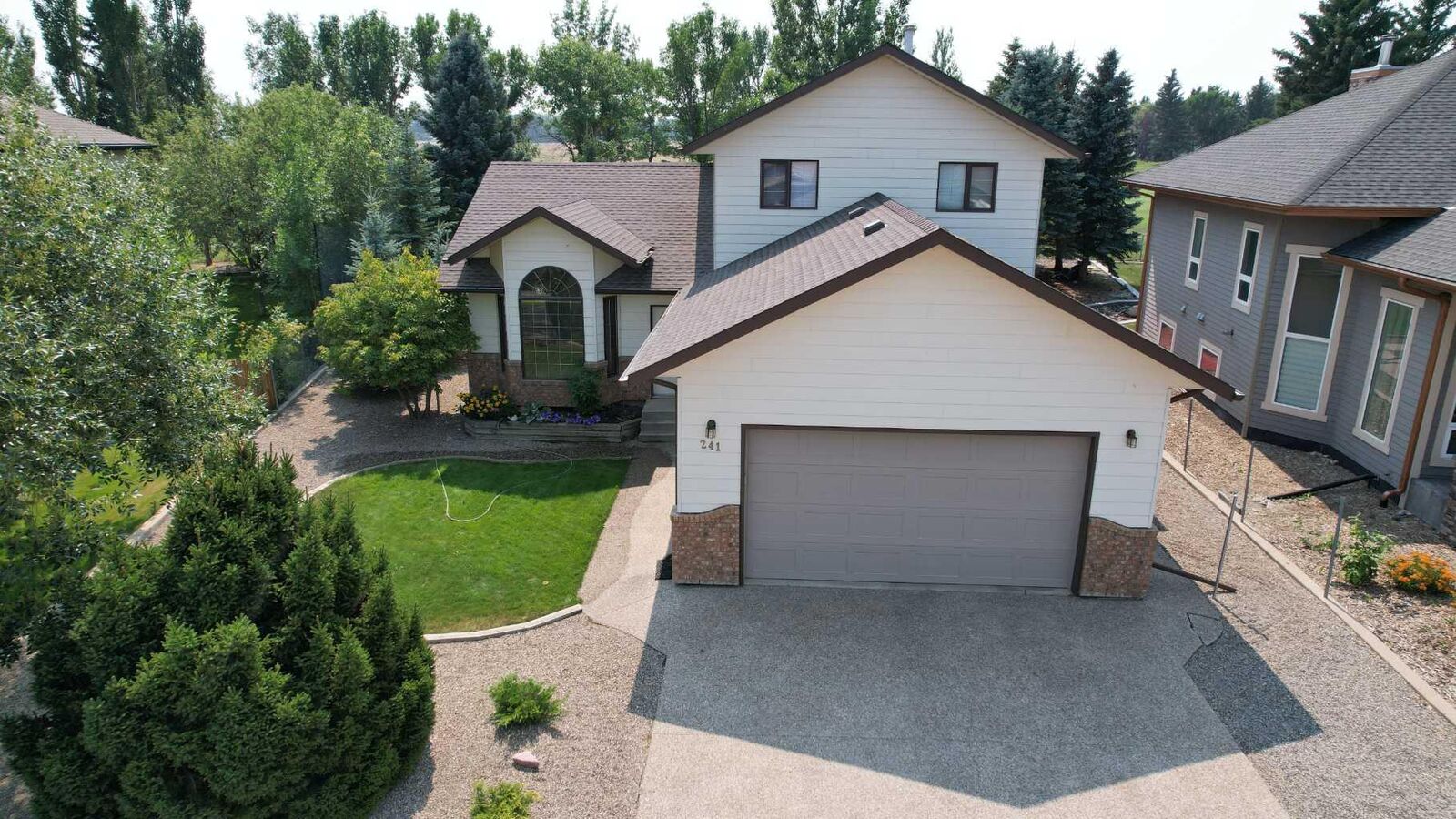 Property Photo: 241 Fairway Drive AB T1M 1M9