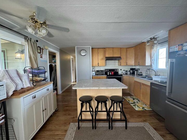 Property Photo:  2715 Westside Drive W 53  AB T1J 4M9 