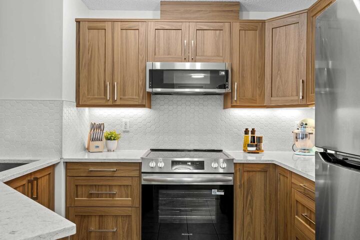 Property Photo:  16969 24 Street SW 5210  AB T2Y 0J8 