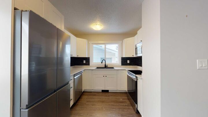 Property Photo:  9730 117 Avenue  AB T8V 3P4 