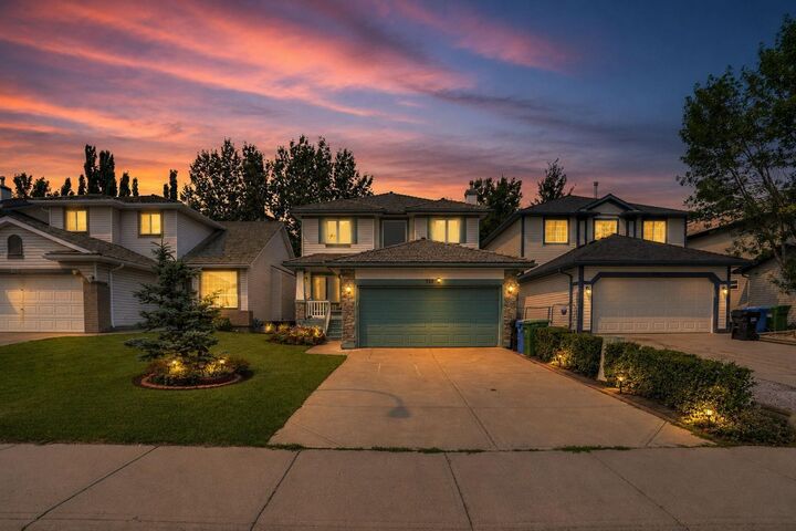 Property Photo: 332 Harvest Hills Drive NE AB T3K 4H7