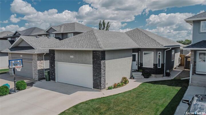 Property Photo: 714 Sutter Crescent SK S7T 0R4