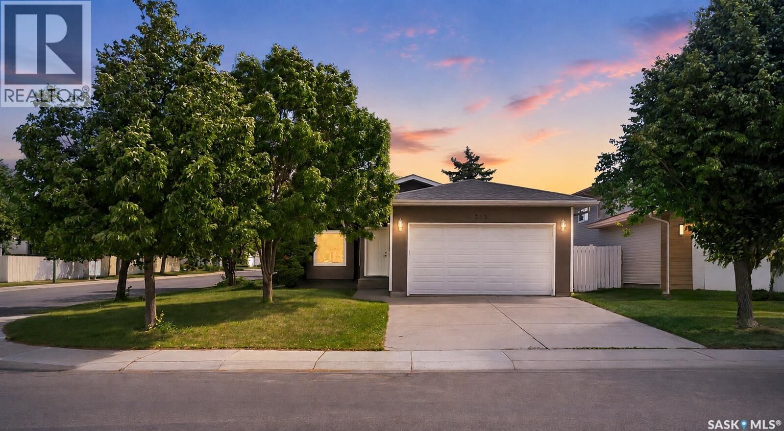 Property Photo:  303 Haslam Crescent  SK S7S 1E4 