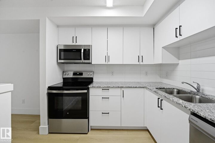 Property Photo: 9504 182 Street NW 416 AB T5T 3A7