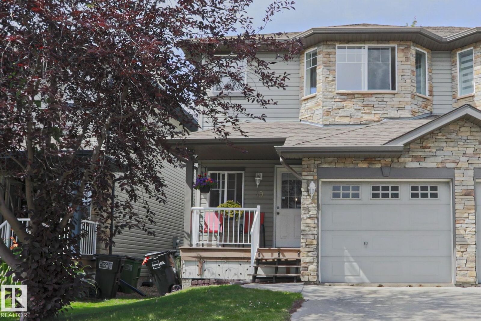 Property Photo: 6304 Sandin Way NW 49 AB T6R 0J8