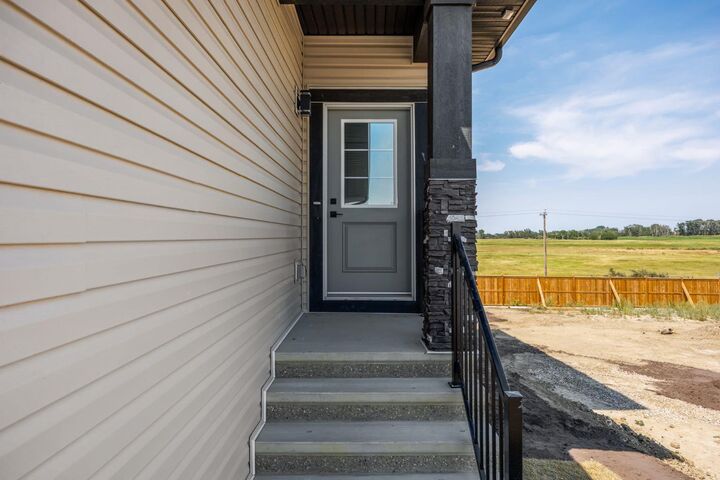 Property Photo: 140 Lakewood Crescent AB T1P 0G6