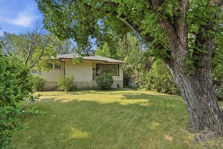 Property Photo: 235 32 Avenue NW AB T2M 2P8
