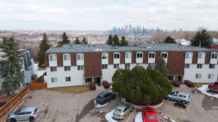 Property Photo:  512 Cedar Crescent SW 201  AB T3C 2Y8 