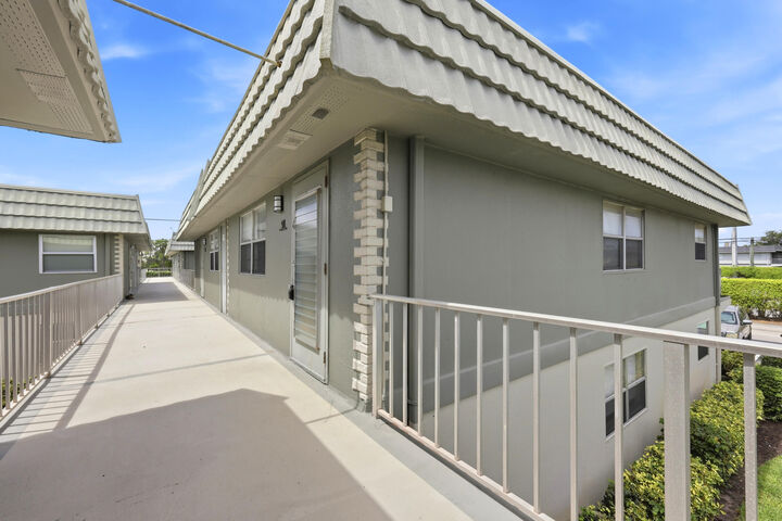 Property Photo:  91 Flanders B  FL 33484 