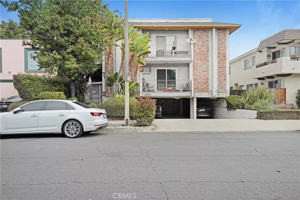 Property Photo:  12735 Caswell 7  CA 90066 