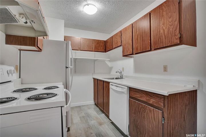 Property Photo: 403 Tait Court 202 SK S7H 5L3