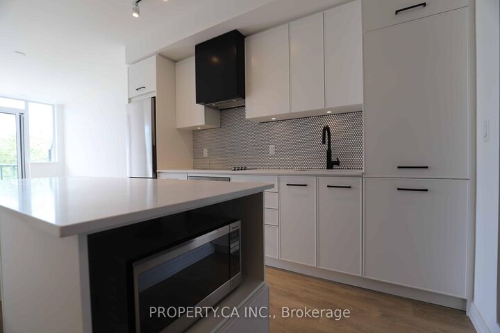 Property Photo: 899 Queen Street E 410 ON M4M 0C8