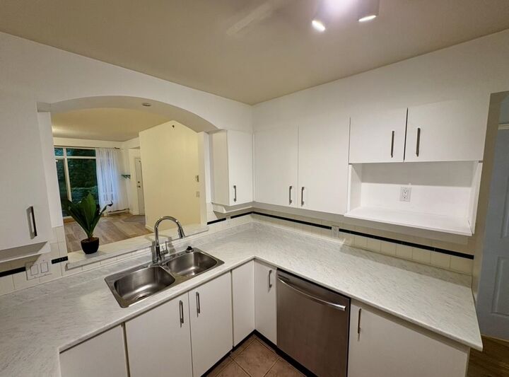 Property Photo: 3600 Windcrest Drive 212 BC V7G 2S5