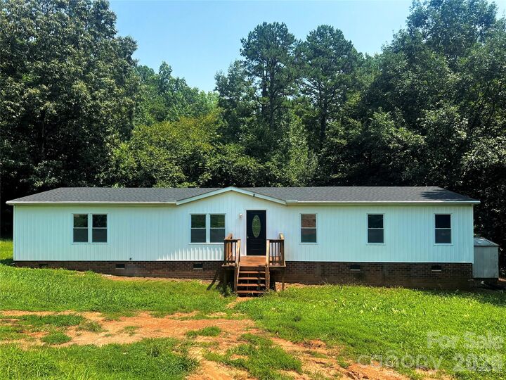 Property Photo: 10380 Turnplow Drive 8 NC 28036