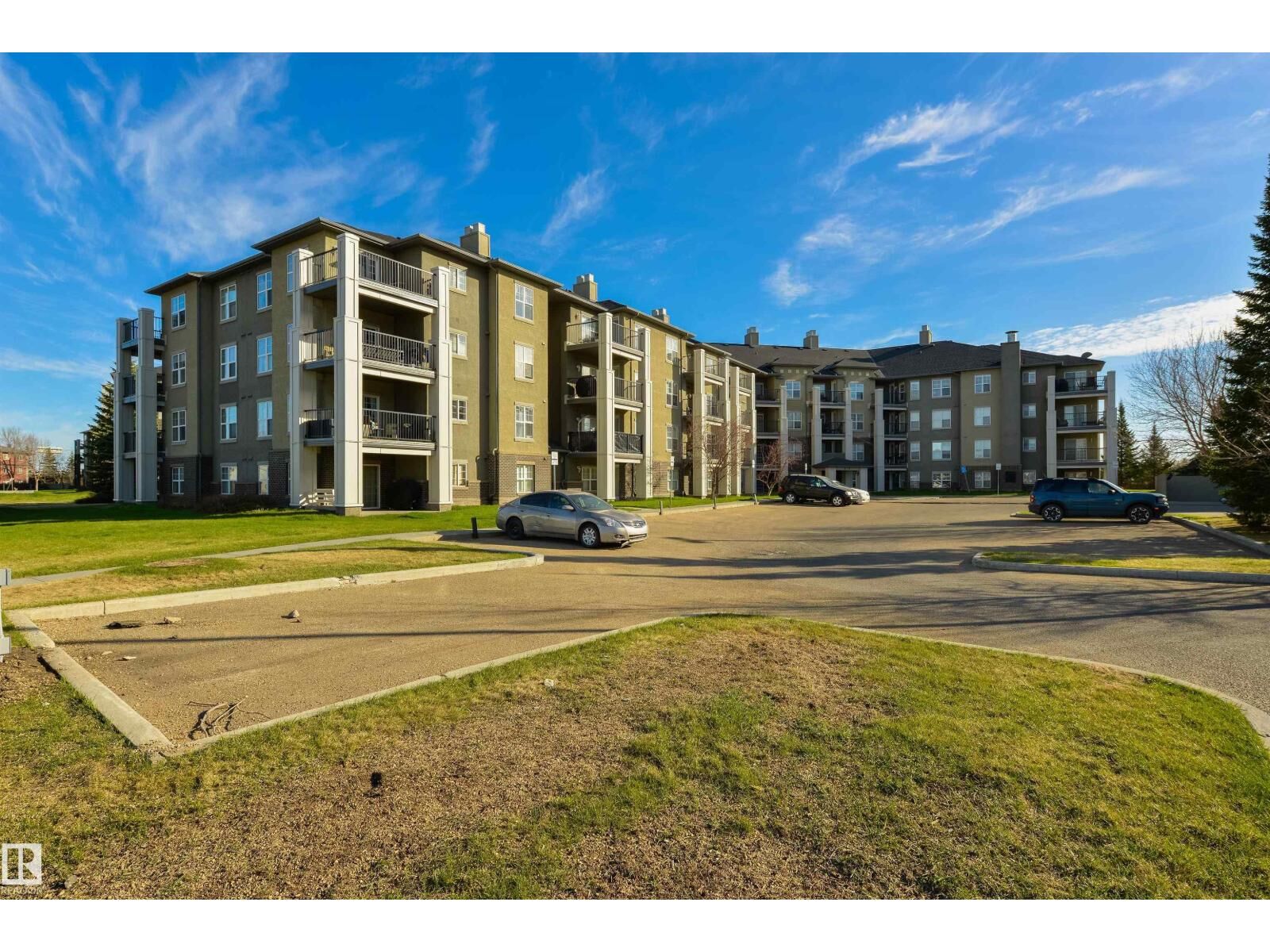 Property Photo:  #202 622 McAllister Lo SW  AB T6W 1N2 