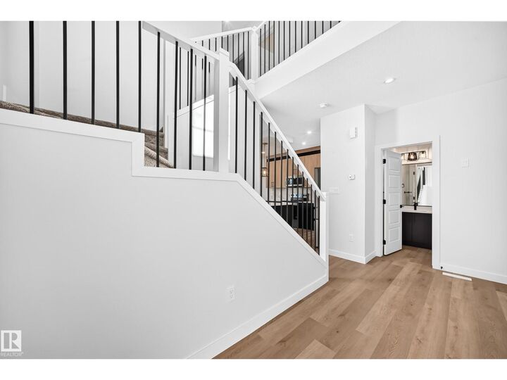 Property Photo: 102 Waverly Wy AB T8L 4H1