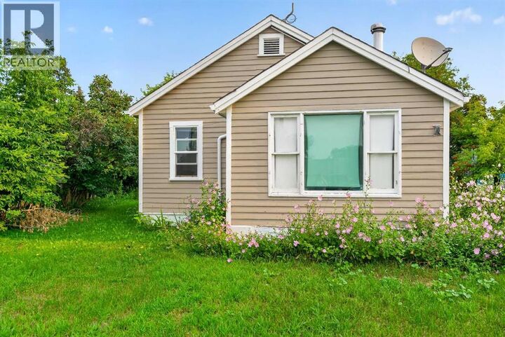 Property Photo:  11216 106 Ave Avenue  AB T0H 0B4 