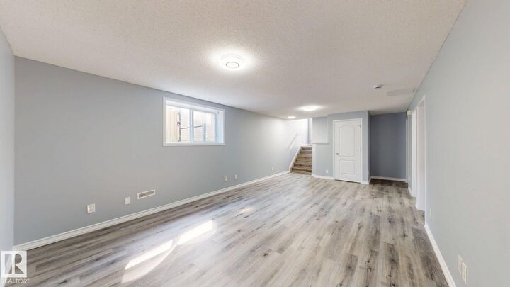 Property Photo:  7848 7 Avenue SW  AB T6X 1N3 