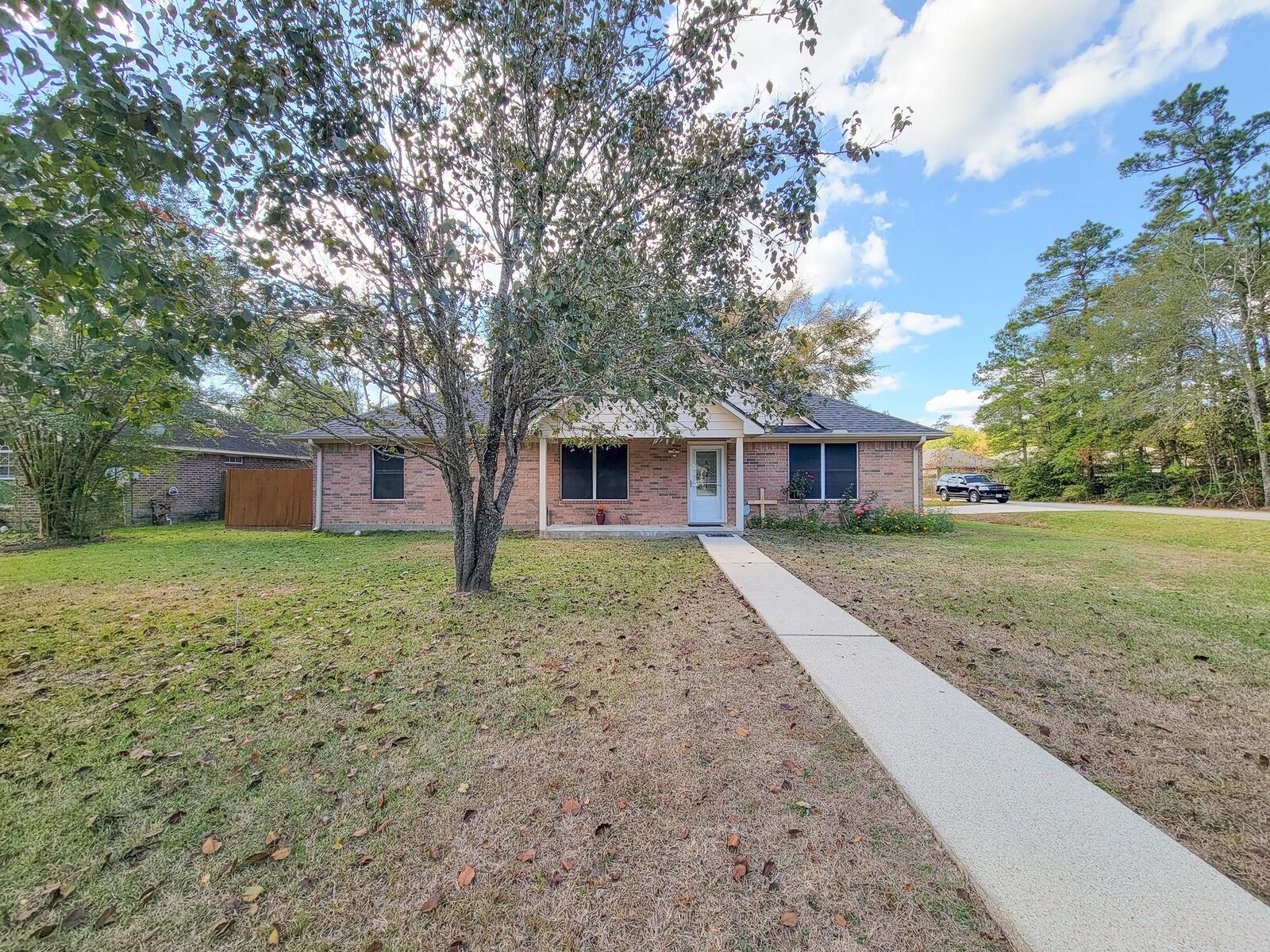 Property Photo:  1000 Shell Avenue  TX 77327 