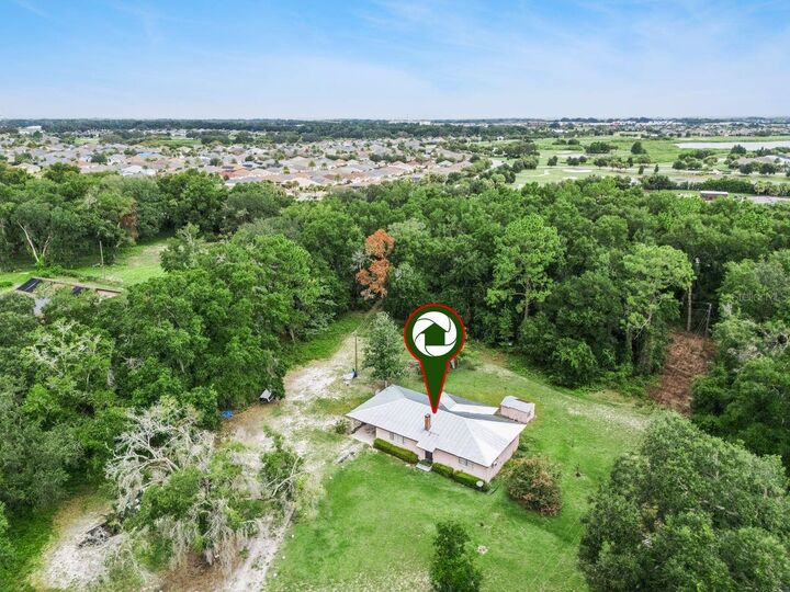 Property Photo: 6184 NE 54th Boulevard FL 34785