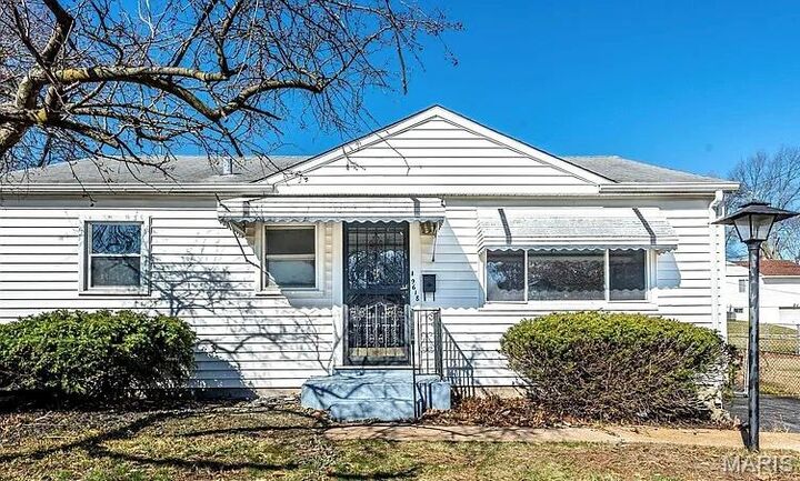 Property Photo:  9618 De Porres Lane  MO 63114 
