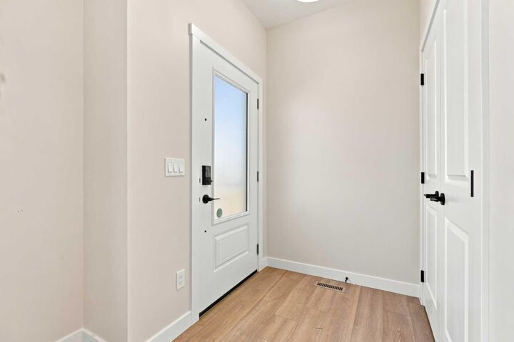 Property Photo: 92 Buffaloberry Manor SE AB T3M 4H3