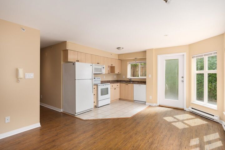 Property Photo: 1099 W 71st Avenue 101 BC V6P 6Y5