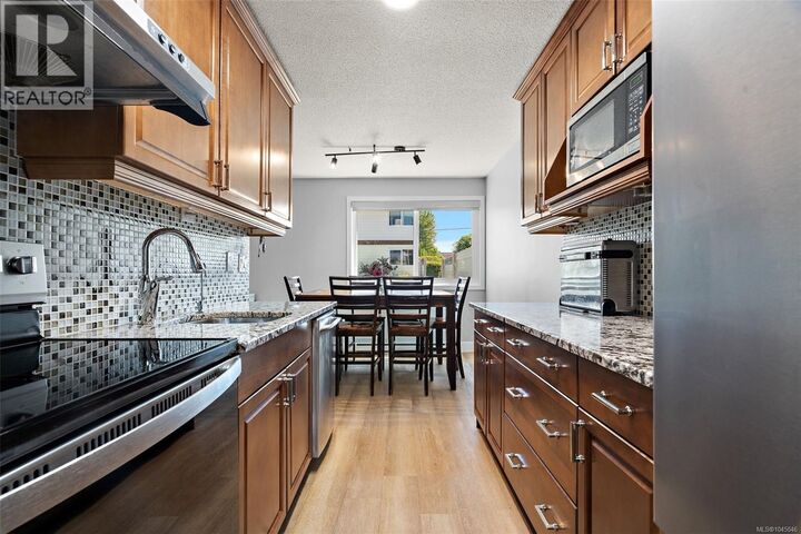 Property Photo:  10046 Fifth Street 7  BC V8L 2X9 