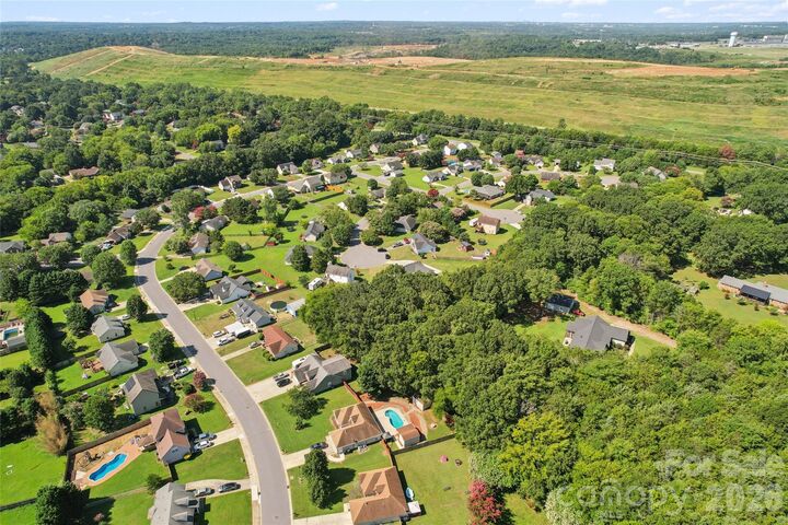 Property Photo:  4563 Sunchase Court NW  NC 28027 