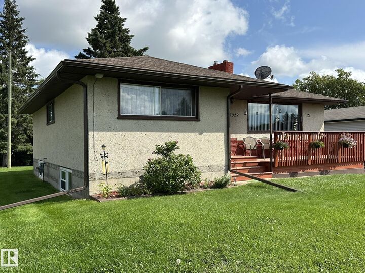 Property Photo:  5029 48 Street  AB T9A 3P0 