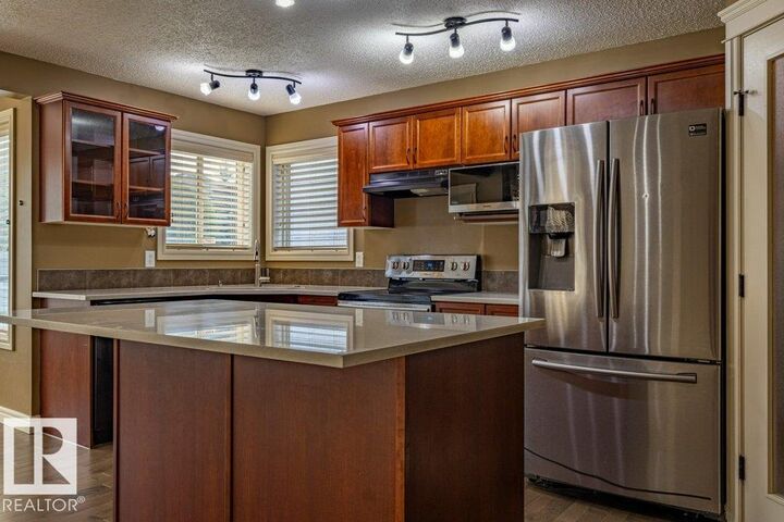 Property Photo: 1115 117A Street SW AB T6W 0B9