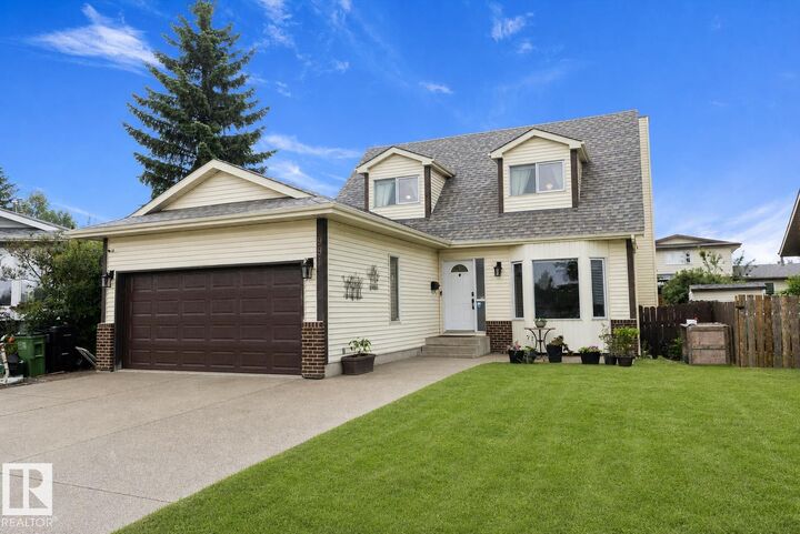 Property Photo:  9811 158 Avenue NW  AB T5X 4V3 