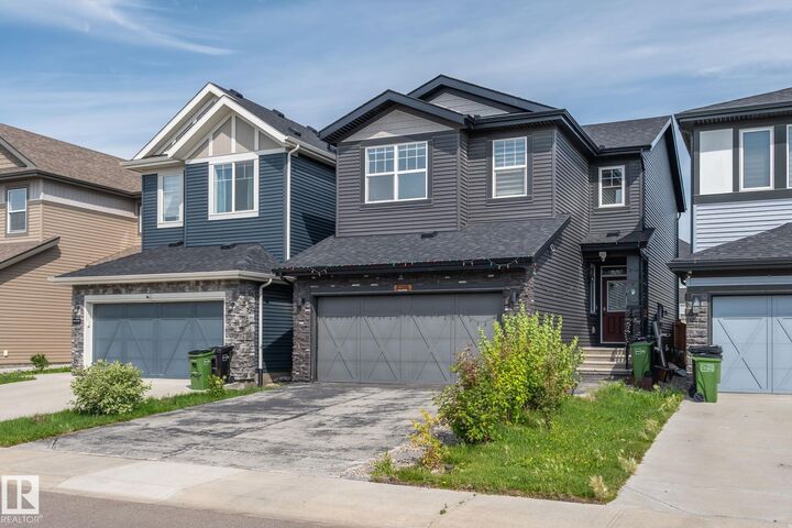 Property Photo: 5210 23 Ave SW AB T6X 2X4