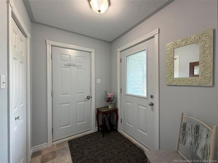Property Photo: 55 De La Capitale Boulevard NB E3V 5A3