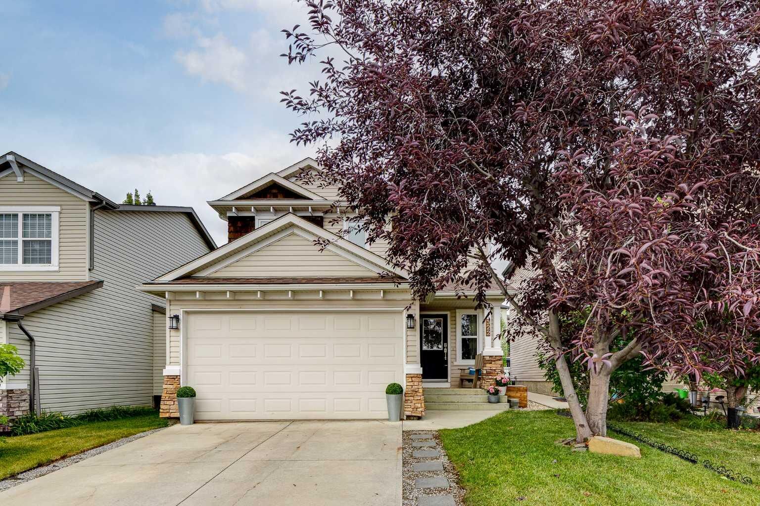 Property Photo:  322 Tuscany Drive NW  AB T3L 2W6 