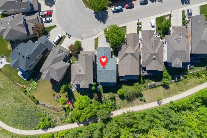 Property Photo:  382 Tuscany Ravine Road NW  AB T3L 3A9 