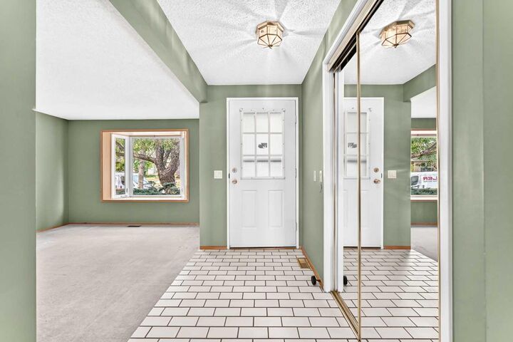 Property Photo: 128 Erin Woods Drive SE AB T2B 2S1