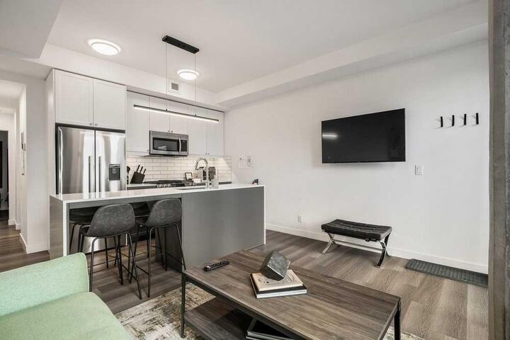 Property Photo: 327 9A Street NW 323 AB T2N 1T7