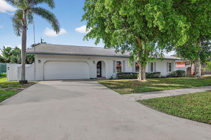 Property Photo:  1544 NW 9th Street  FL 33486 