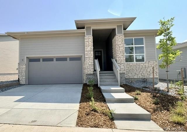 Property Photo:  415 Basin Daisy Street  CO 80104 