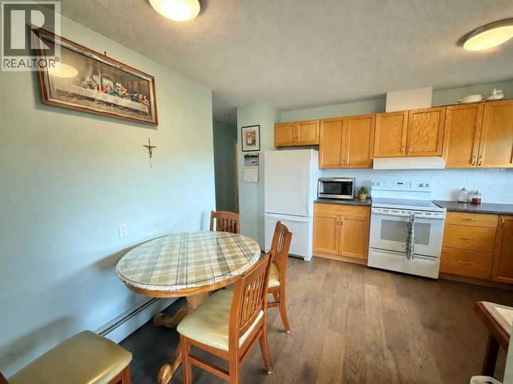 Property Photo: 215 14 Street AB T9W 1G4