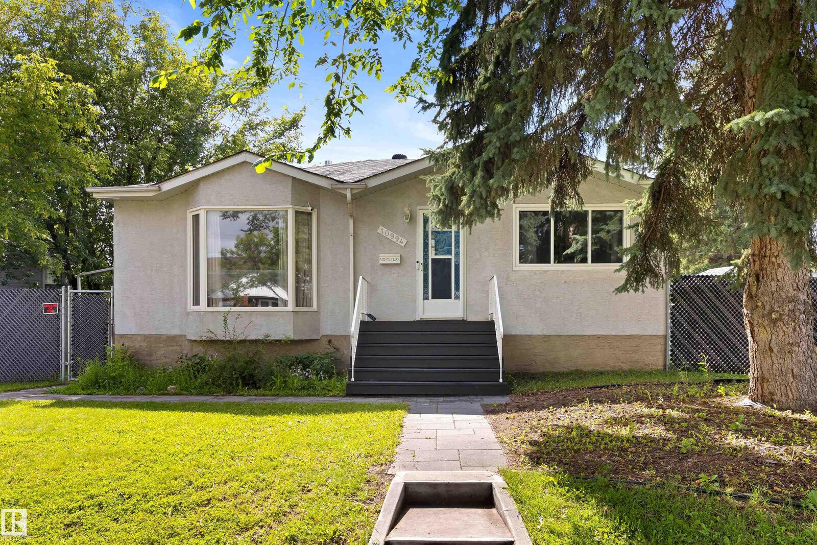 Property Photo: 10994 135 Street NW AB T5M 1K2