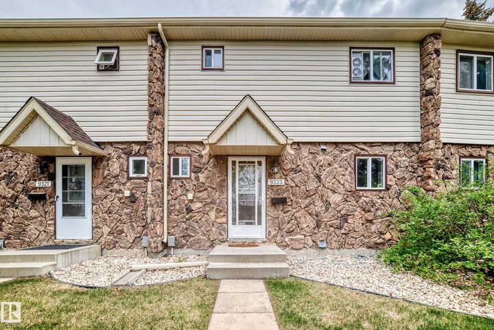 Property Photo:  9323 Morinville Drive  AB T8R 1J9 