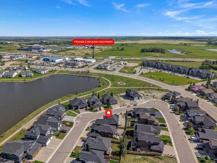 Property Photo: 67 Lakes Estates Circle AB T1P 0B6