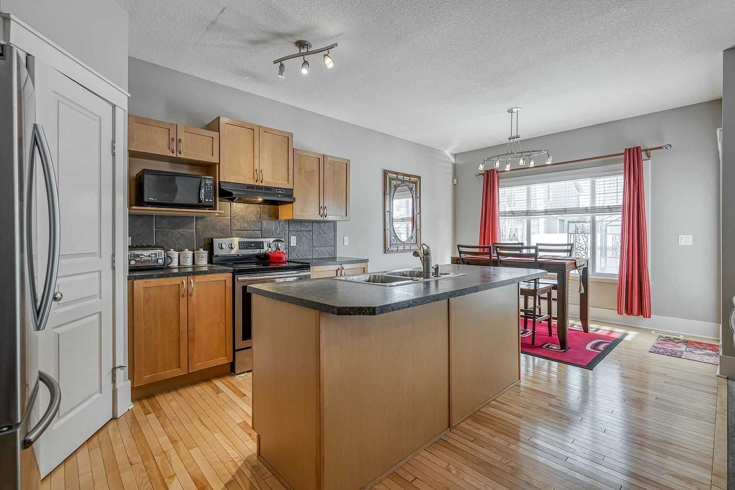 Property Photo: 177 Cougartown Circle SW AB T3H 0A3