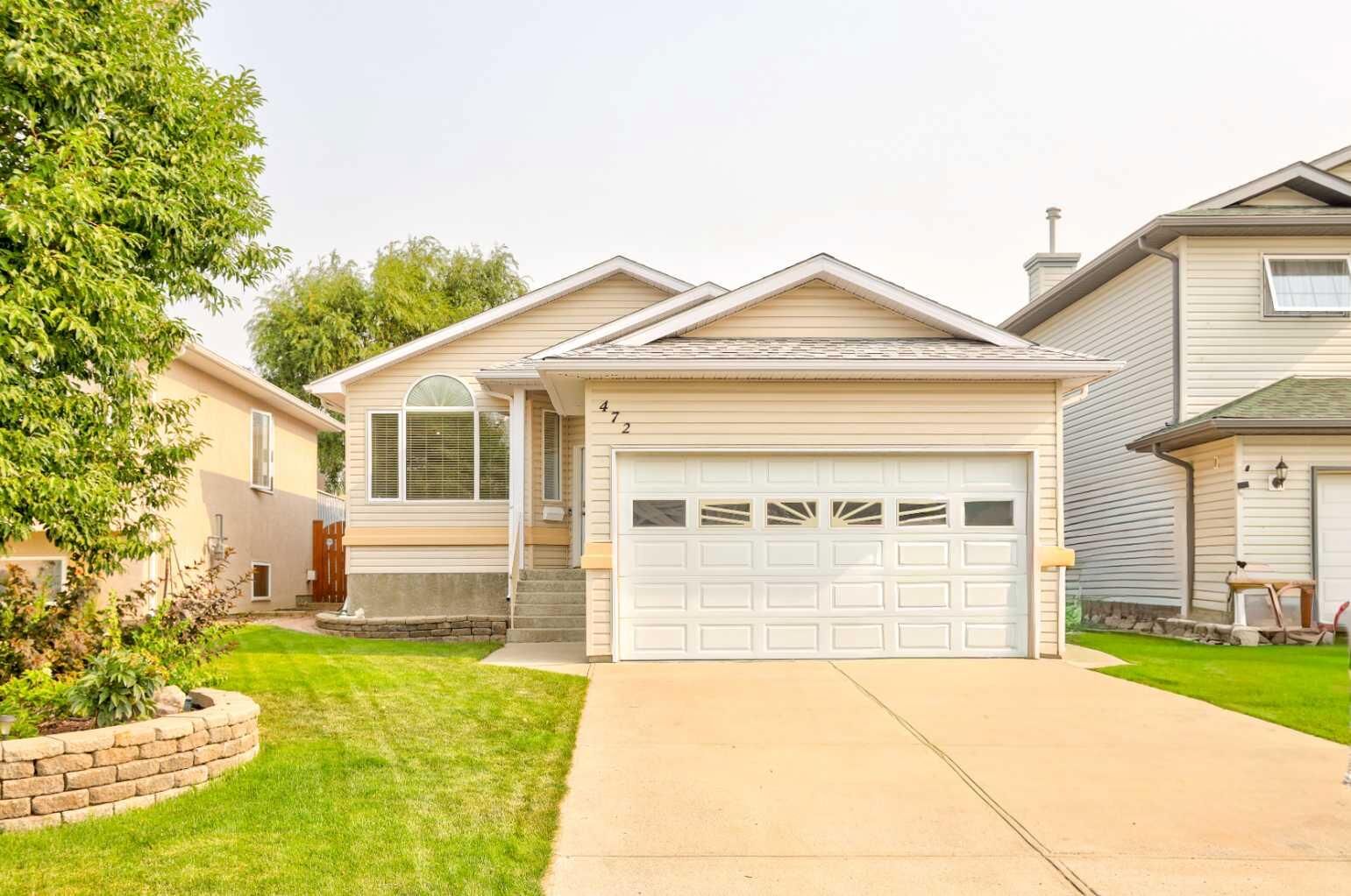 Property Photo: 472 Heritage Boulevard W AB T1K 7V9