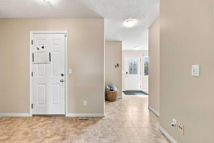 Property Photo: 754 Luxstone Gate SW AB T4B 0H3